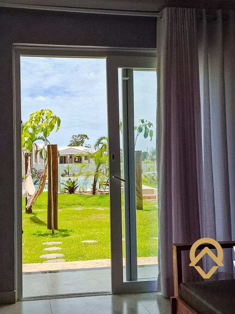Casa com 3 suítes, sala climatizada, área gourmet privativa,