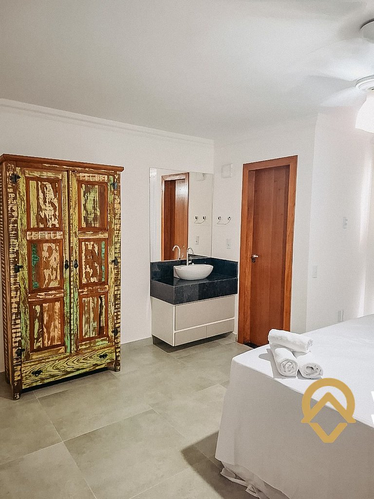 Casa com 3 suítes, sala climatizada, área gourmet privativa,