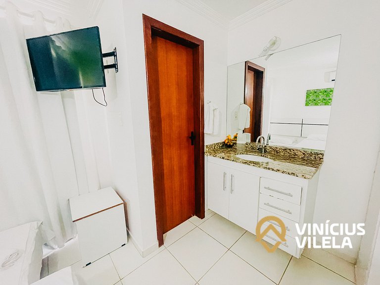 Casa com 3 suítes todas com ar condicionado, churrasqueira p