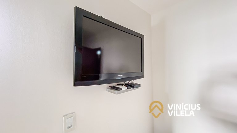 Casa com 3 suítes ambas com ar condicionado e TV, banheiros