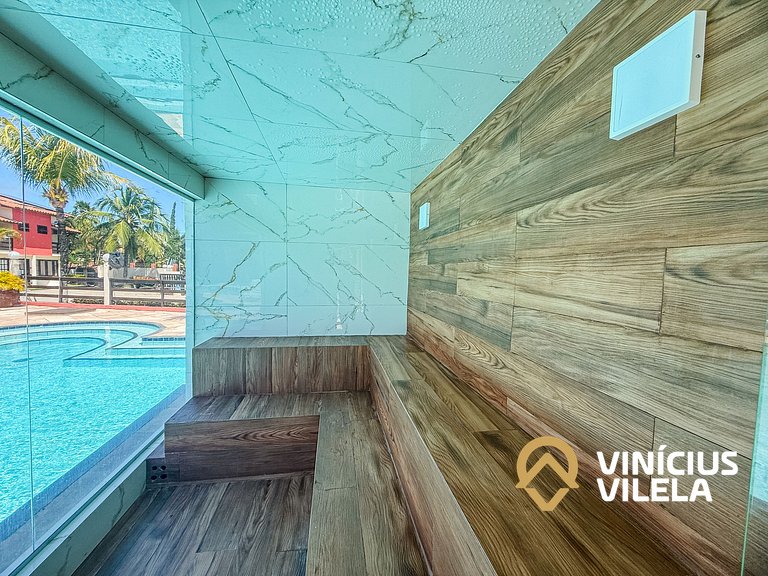 Casa com 2 suítes ambas com ar condicionado e TV, churraquei