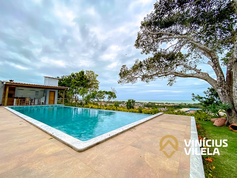 Casa duplex com 3 quartos, sendo 2 suítes a aproximadamente