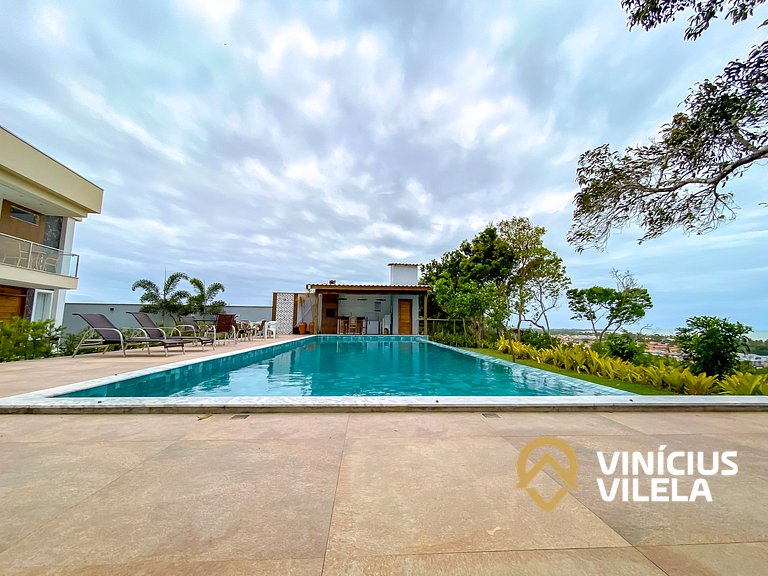 Casa duplex com 3 quartos, sendo 2 suítes a aproximadamente