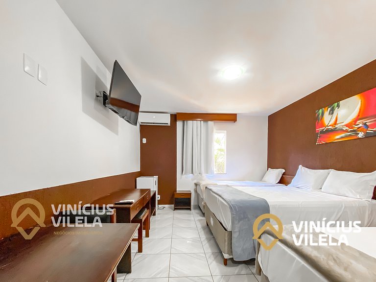 Suiíte com ar , frigobar proximo ao axé Moi