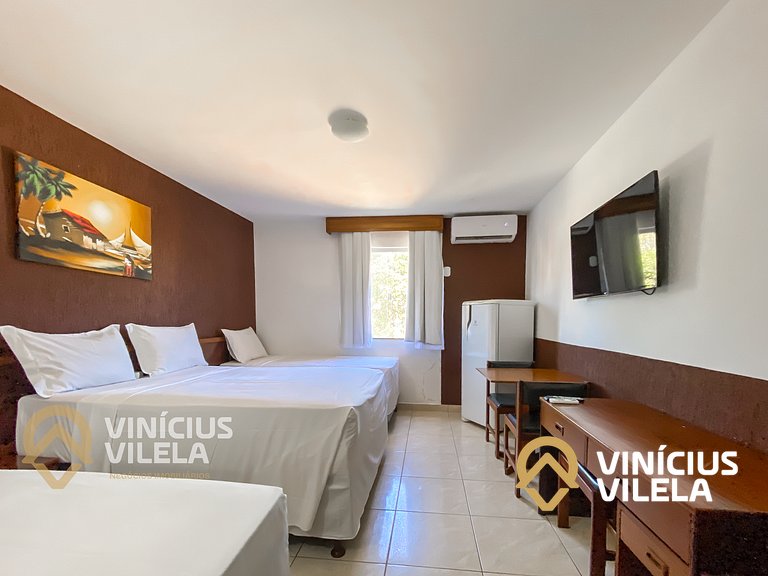 Suiíte com ar , frigobar proximo ao axé Moi