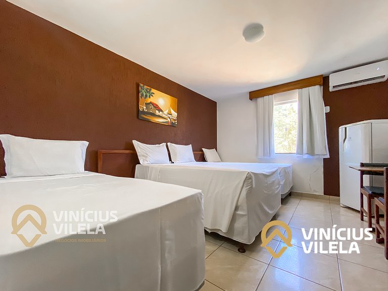 Suiíte com ar , frigobar proximo ao axé Moi